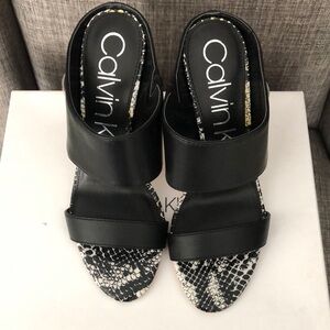 Brand new Calvin Klein slip on heels size 8 medium
